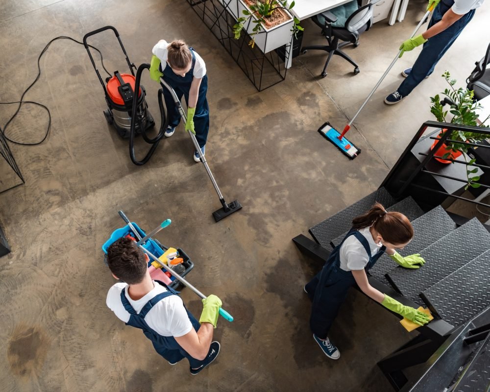 top-view-of-cleaning-company-team-cleaning-modern-office.jpg top-view-of-cleaning-company-team-cleaning-modern-office.jpg